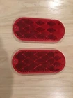 Two Bargman Trailer Lights 70-78-050 Reflector W/mounting Holes Oblong Red New. Price: $8.35.
