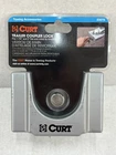 Curt 23079 Trailer Lock Most 2" & 1-7/8" Flat Rolled Lip Couplers Ax New. Price: $35.99.
